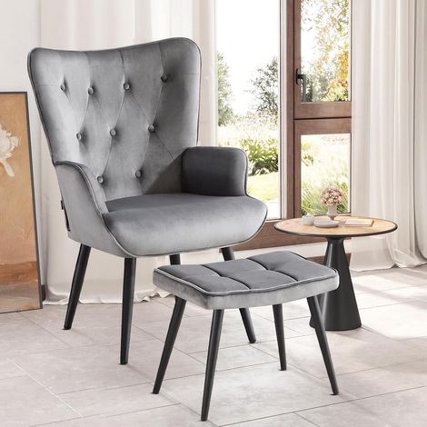 Fauteuil crapaud en velours gris avec repose-pieds, design ergonomique (1/5)