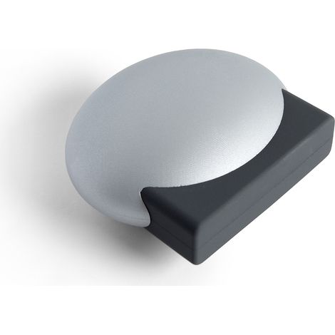 Tope de Puerta  Estilo Decorativo  Fabricado en TPS  Acabado en Aluminio  Medidas 554823 mm  Sistema de Fijación Adhesivo / Atornillado  1 Unidad -