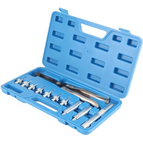 Kit d'outils pour la réparation des joints de queue de soupape des moteurs automobiles, comprenant une pince à joint de queue de soupape et une douille adaptatrice. (1/5)