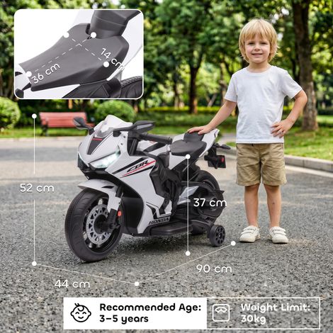 Moto électrique pour enfants sous licence Honda, batterie rechargeable 6V, vitesse maximale 3 km/h, blanche. (1/5)