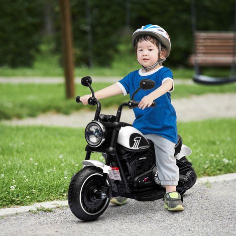Moto électrique pour enfants de 18 à 36 mois avec batterie 6V, phare et stabilisateurs amovibles, blanche