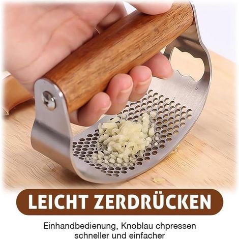 Spremiaglio manuale ad anello, in acciaio inox con azionamento a leva, trita aglio e zenzero portatile e facile da usare per la cucina domestica. (1/5)
