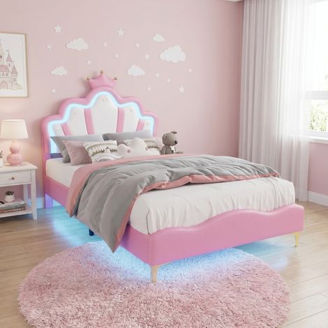 Letto singolo per bambina 140x190 cm imbottito, con LED, testiera a forma di fiore e corona, rete a doghe in legno, letto principessa in similpelle - Rosa