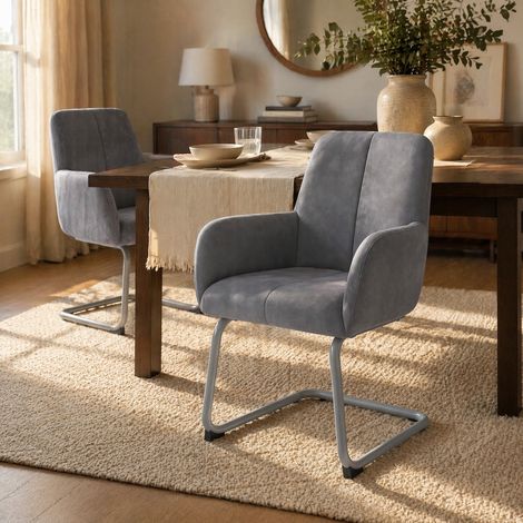 Lot de 2 chaises de salle à manger grises en cuir régénéré avec accoudoirs intégrés, structure en métal incurvée, siège ergonomique rembourré – CHICFURN (1/5)
