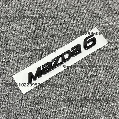 (MAZDA 6, carbone) - Accessoires extérieurs en carbone noir argenté pour voiture Mazda : autocollant logo/lettre sur le coffre. (1/5)