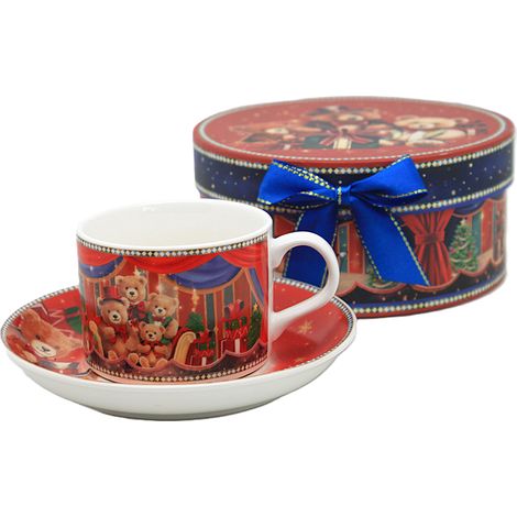 Una taza con ositos de peluche y su platillo: perfecta para regalar en Navidad. (1/5)