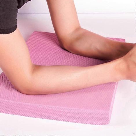 Planche d'équilibre en TPE haute densité rose, idéale pour le yoga, le pilates et les exercices de stabilité à domicile. (1/5)