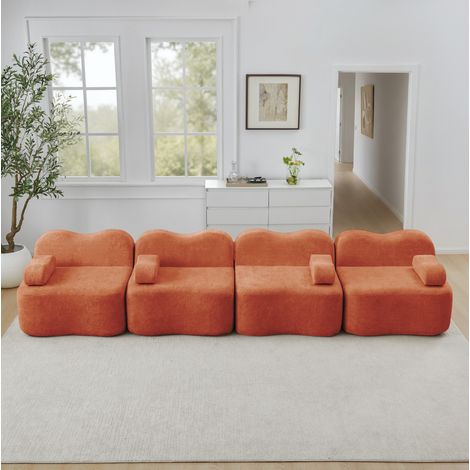 Canapé modulable 4 places en velours orange, forme ondulée, assise profonde avec pouf relié (1/5)