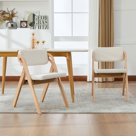 Chaises pliantes empilables en bois massif (hêtre), avec assise rembourrée (lot de 2), idéales comme chaises d'appoint pour la cuisine, le bureau, les mariages, les fêtes et les pique-niques. Beige. (1/5)