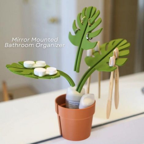 Nouveau miroir Monstera - Organisateur de salle de bain avec miroir et porte-brosse à dents en bambou Monstera (1/5)