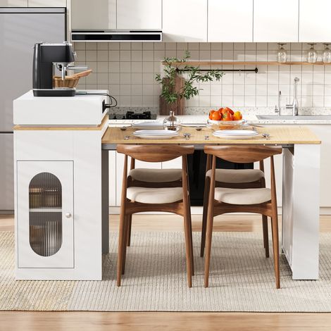 Isla de cocina extensible 83-146.5x46-96 cm blanca de MDF y vidrio con ruedas y enchufes