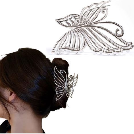Grande pince à cheveux argentée pour femme, ornée d'un élégant motif papillon. Résistante aux cheveux épais, cette pince offre une tenue ferme et convient à un usage quotidien. (1/3)