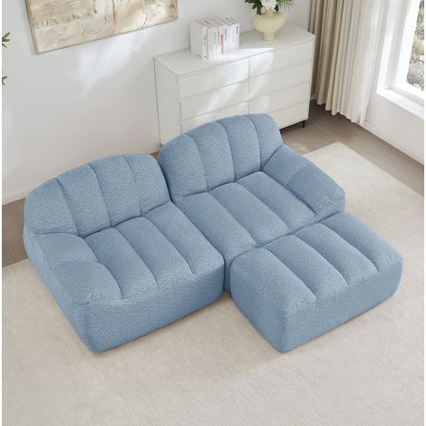 Sofá modular esquinero 210x165x79 cm azul en forro polar granulado con otomana y sin montaje (1/5)