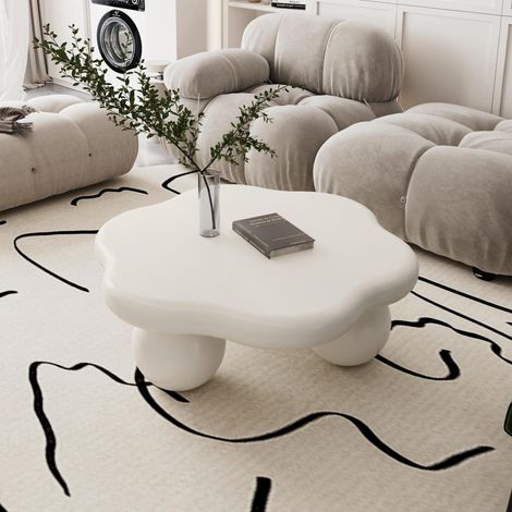 Table basse crème forme nuage 80 cm, design pétale minimaliste, pieds sphériques, sécurisée pour enfants et animaux, gain de place pour salon.