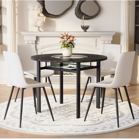 REDOM - Set composto da tavolo rotondo e 4 poltrone in similpelle bianca con cuscini comfort più ampi e venature del legno nere. (1/5)
