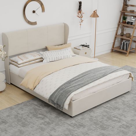 Letto matrimoniale 160x200 cm in tessuto beige e struttura metallica con testiera imbottita.