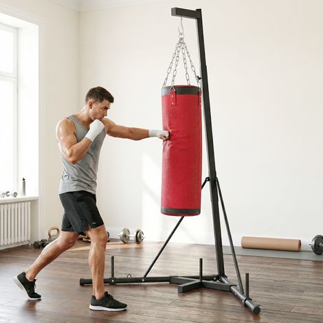 Supporto per sacco da boxe regolabile in altezza da 185 a 231 cm. Supporto per sacco da boxe autoportante con base triangolare. Porta pesi.