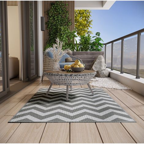 Alfombra de exterior impermeable de polipropileno 121 x 182 cm, gris claro y blanco OKMYHOME (1/5)