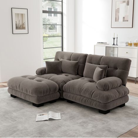 Divano modulare angolare in ciniglia marrone con ottomane mobili, cuscini lombari e decorativi, design cloud (1/5)