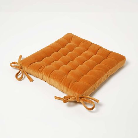HOMESCAPES Burnt Orange Quilted Velvet Chair Pad, 40 x 40 cm