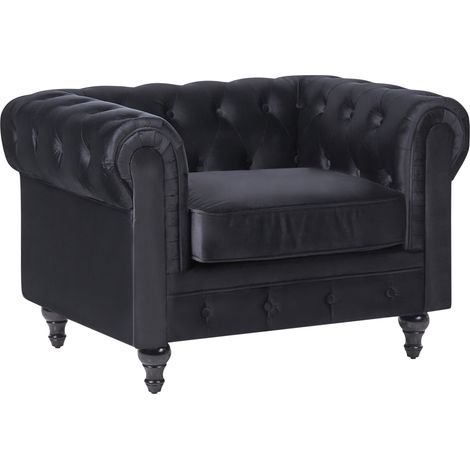Sillón tapizado en tela de terciopelo negro patas de madera oscura contemporáneo Chesterfield