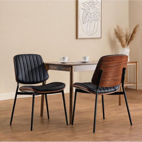 Fauteuils de salle à manger vintage en simili cuir matte noir (1/5)