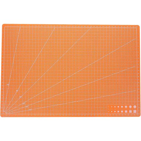 Tapis de découpe rotatif double face en PVC auto-agrippant, idéal pour les projets de couture, de patchwork et autres travaux manuels. (1/5)
