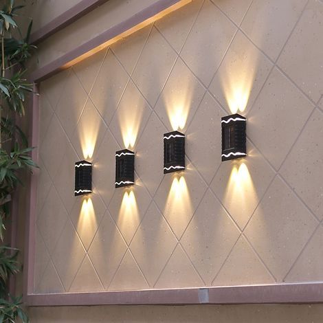 Set mit 4 Solar-Wandleuchten mit je 4 LEDs, geeignet für Balkon, Zaun und Garten, wasserdicht, automatische Ein-/Ausschaltfunktion, warmweißes Licht (1/5)
