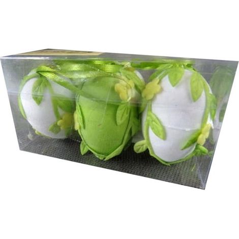 Un juego de 6 huevos con motivos de flores y hojas de tela verde pegados sobre ellos.