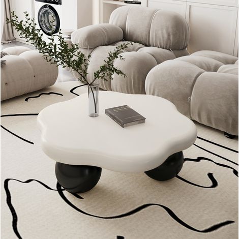 Table basse en forme de nuage avec pieds sphériques noirs, dessus blanc, design entièrement arrondi (1/5)