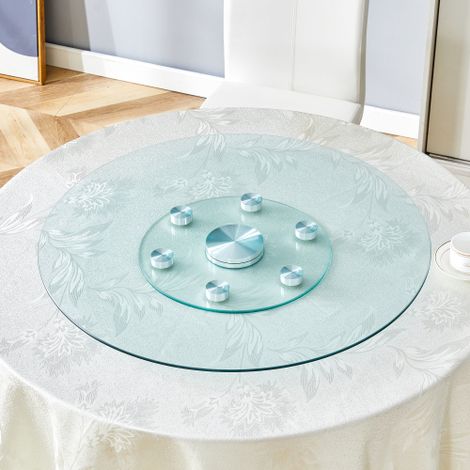 Tischplatte. Zweistufige, drehbare runde Glasplatte. Der obere Glasdurchmesser beträgt 77 cm, der untere 38 cm. Das drehbare Design ermöglicht ein einfacheres Aufnehmen und Abstellen von Gegenständen.