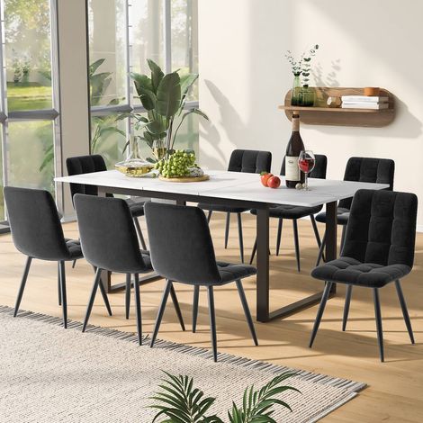 Ensemble repas extensible 140180x80cm avec 8 chaises en velours gris, plateau mdf blanc et pieds noirs (1/5)
