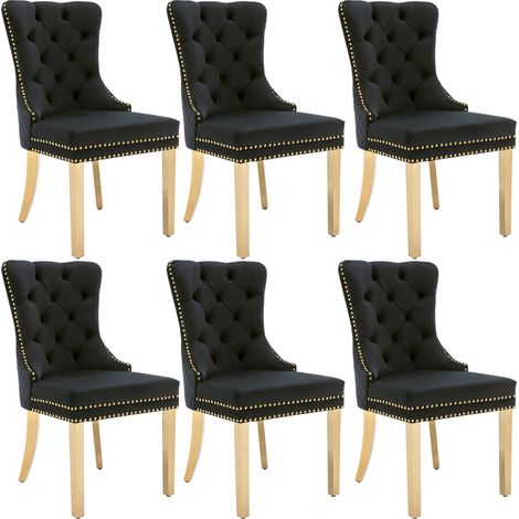 CAIziSix chaises de salle à manger noires capitonnées avec pieds plaqués or (1/5)