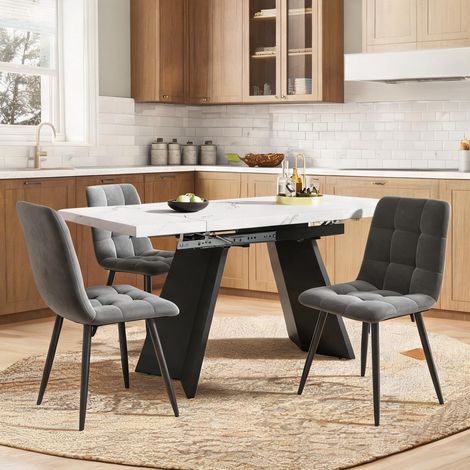 Ensemble table extensible blanc et noir avec chaises velours (1/5)