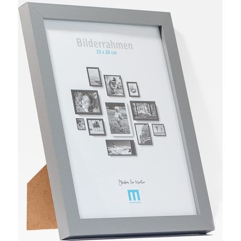 Cadre photo moderne et intemporel en bois MDF gris pour petites photos et images de 15 x 20 cm avec protection en verre acrylique inclus. Il peut être utilisé comme support de table ou à (1/4)