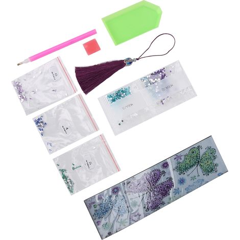 Marque-pages à pompons à faire soi-même : Marque-pages en cuir brodés de couleurs vives, réalisés avec une peinture diamant de forme irrégulière (1/5)