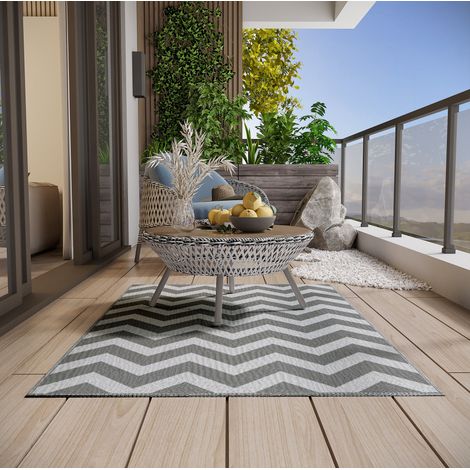 Tapis d'extérieur imperméable réversible 121 x 182 cm en polypropylène, gris clair et blanc DESVIAE (1/5)