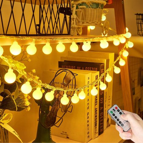 Cordon lumineux LED étanche 10 mètres 100 ampoules, alimenté par piles, 8 modes avec télécommande et minuterie, idéal pour jardin, terrasse et décoration de mariage en intérieur/extérieur. (1/5)