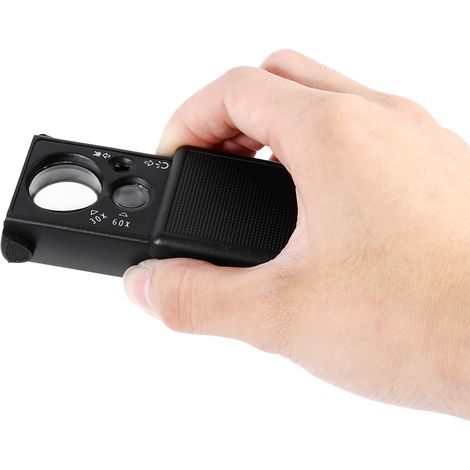 Mini loupe de poche avec grossissement 30x/60x, double lentille, éclairage LED UV et mécanisme d'extraction. (1/5)