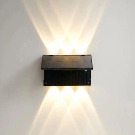 Applique murale extérieure LED solaire avec détecteur crépusculaire, éclairage indirect (montée et descente), idéale pour porche, clôture ou éclairage solaire. Sur pied décoratif. (1/4)