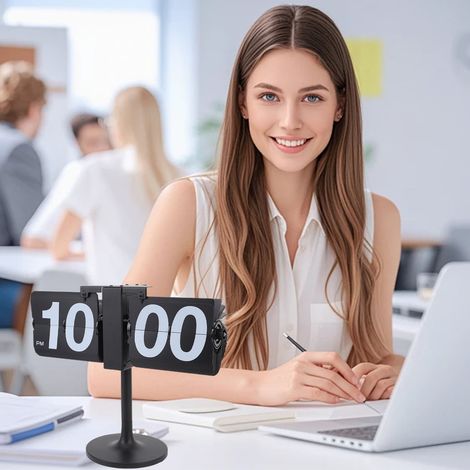 Reloj de mesa mecánico negro, a pilas, con autonomía de 12 horas, pantalla automática y soporte extensible. (1/5)