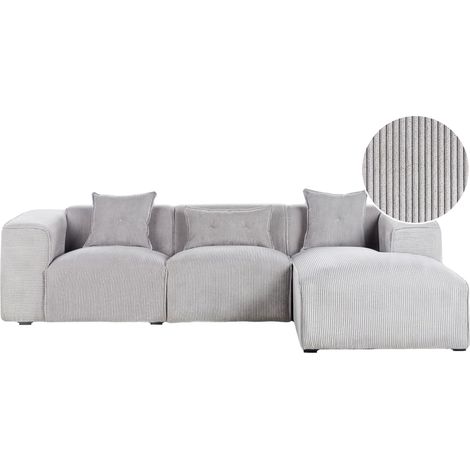 Divano Angolare lato sinistro in velluto a coste grigio chiaro con cuscini decorativi Dolva