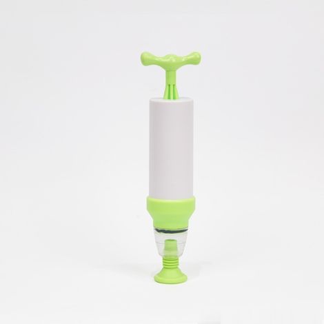 Green manual vacuum pump.
