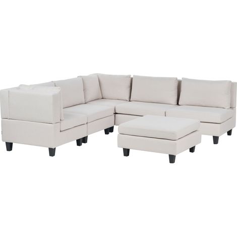 Divano componibile a 5 posti imbottito in tessuto beige chiaro gambe nere lato destro con ottomana Unstad