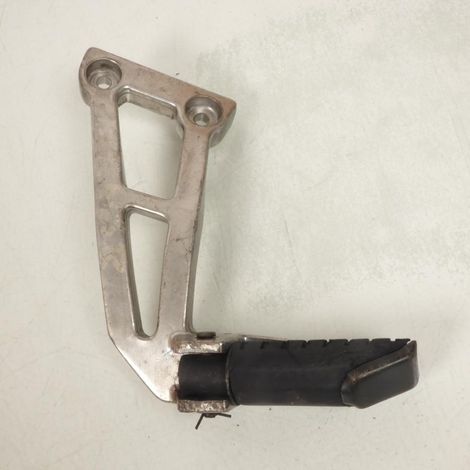 [PRODUIT D'OCCASION] Platine de repose pied passager gauche origine pour moto Honda (1/3)