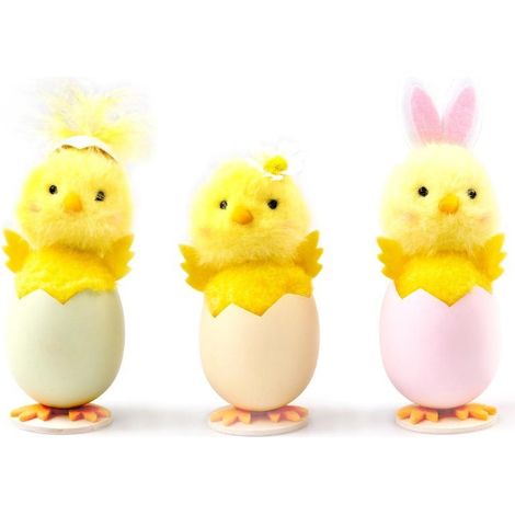 Pollito de Pascua en una mezcla de conchas