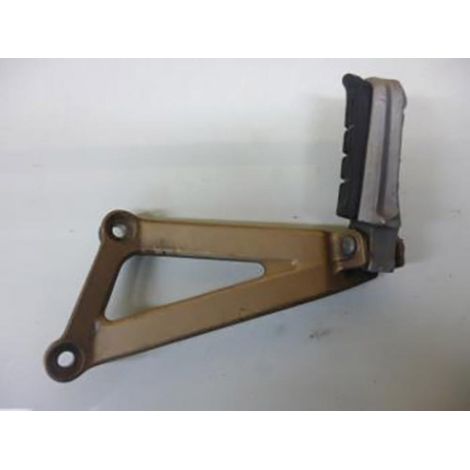 [PRODUIT D'OCCASION] Platine de repose pied passager gauche origine pour moto Honda (1/2)