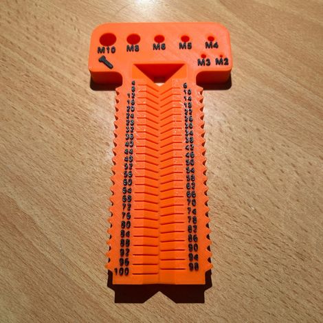 Outil de mesure de vis M2-M10 + L4-100 mm. Cet outil permet de mesurer les vis métriques de M2 à M10, d'une longueur de 4 à 100 mm. - Orange-rouge