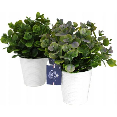 Planta artificial en maceta blanca - decoración de interiores (1/5)