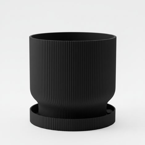 Un vaso da fiori nero, moderno e leggero, con sottovaso, semplice e funzionale.